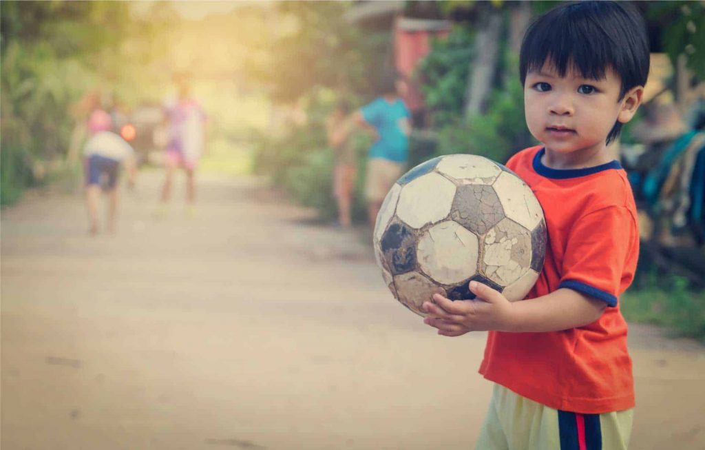 Boy with ball compressed