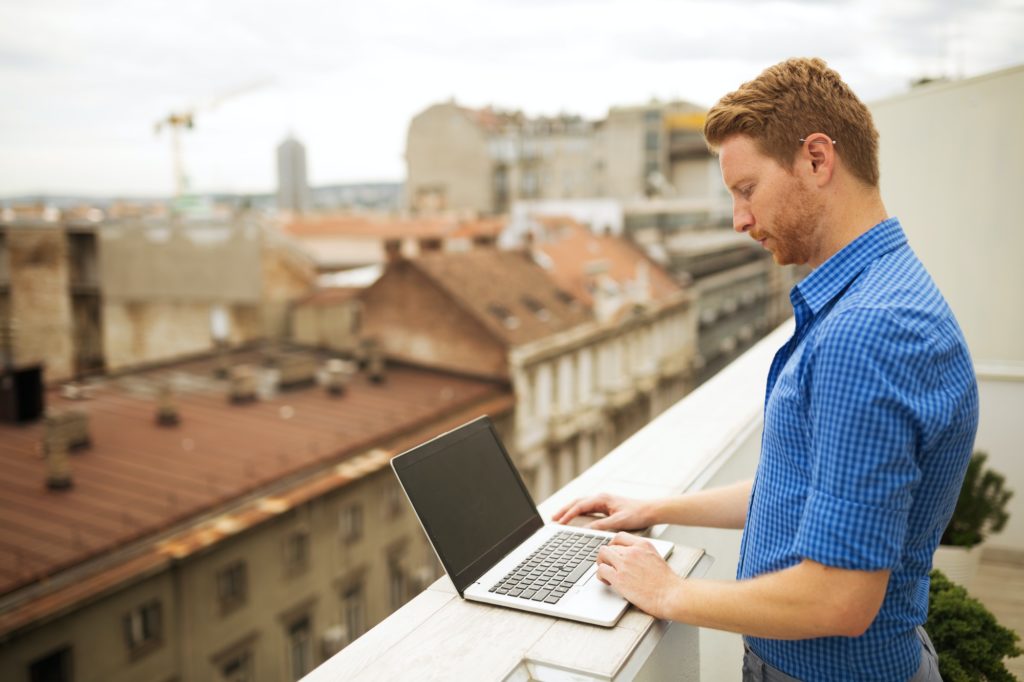 Businessman working on rooftop