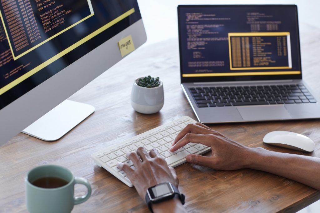 Software Programmer Writing Code Close Up